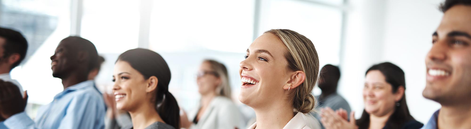 people smiling in a classroom